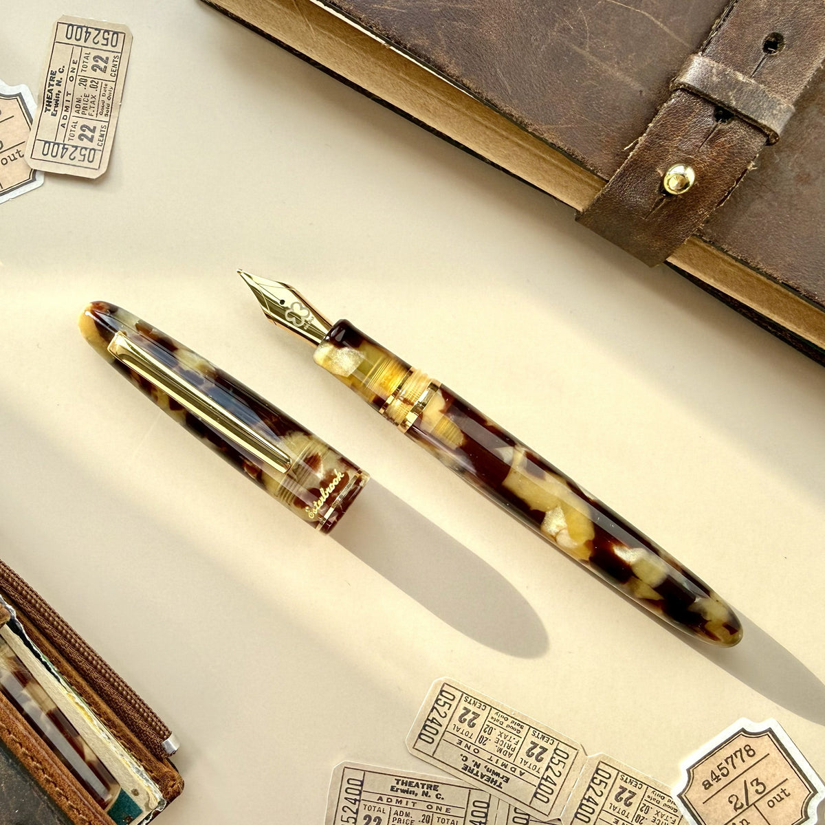 Esterbrook Estie Tortoise fountain pen with gold trim in honey-amber and dark-brown tortoiseshell acrylic