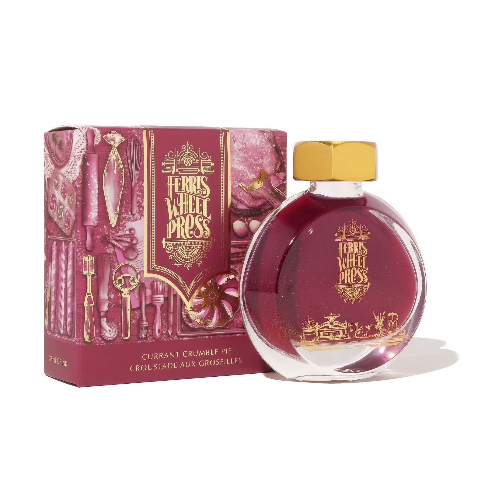 Clear bottle of 'Currant Crumble Pie' ink that is a berry colored ink with packaging on a white background