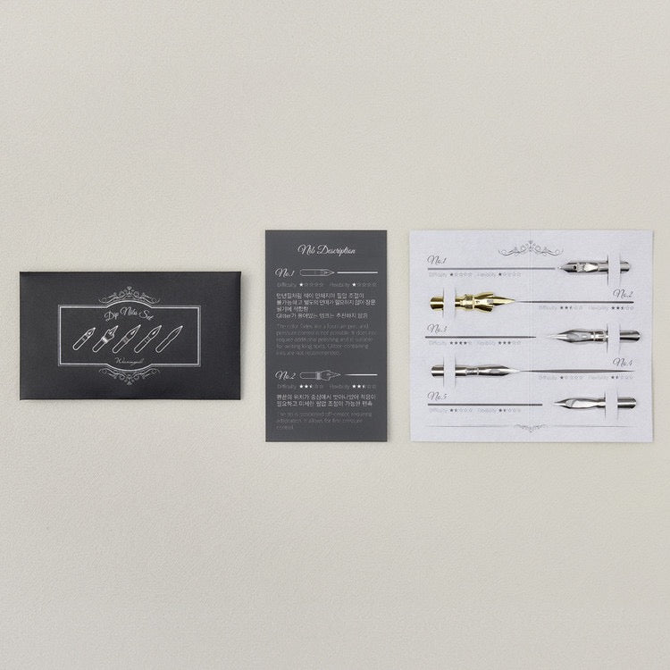 Black envelope with wax seal and selection of nibs and description card