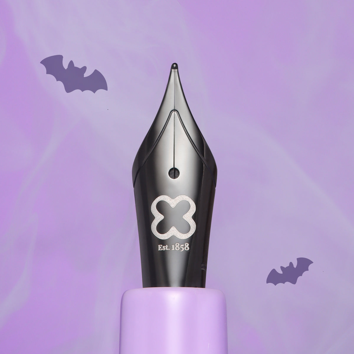 Close-up of the black Esterbrook steel nib with the silver Esterbrook logo and Est. 1858, on the Sweetly Haunted Estie