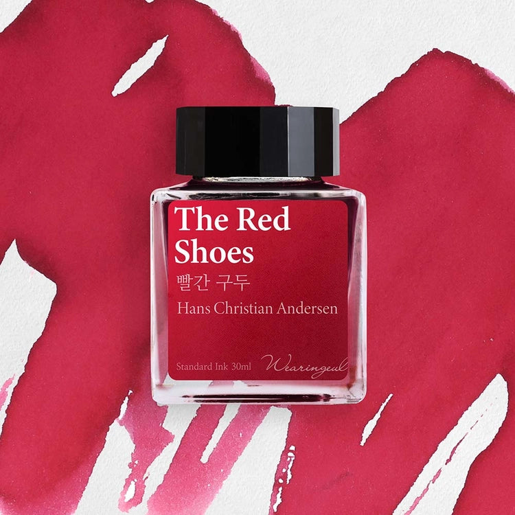 Wearingeul The Red Shoes fountain pen ink bottle with magenta ink swatch background
