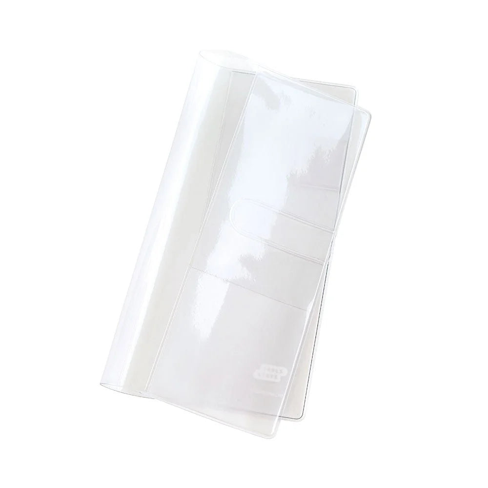 Hobonichi clear cover for the Techo Weeks and Weeks Mega — transparent slip-on cover folded, showing the pockets and side flaps