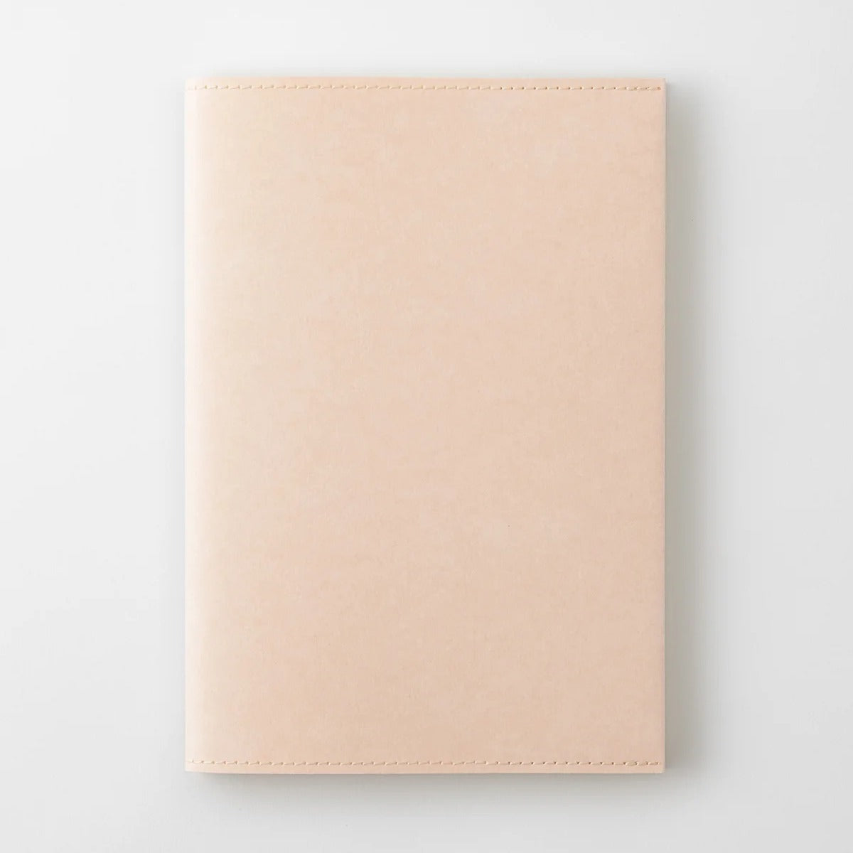 MD Notebook paper cover in light pink Cordoba paper, A5 size, shown closed from the front