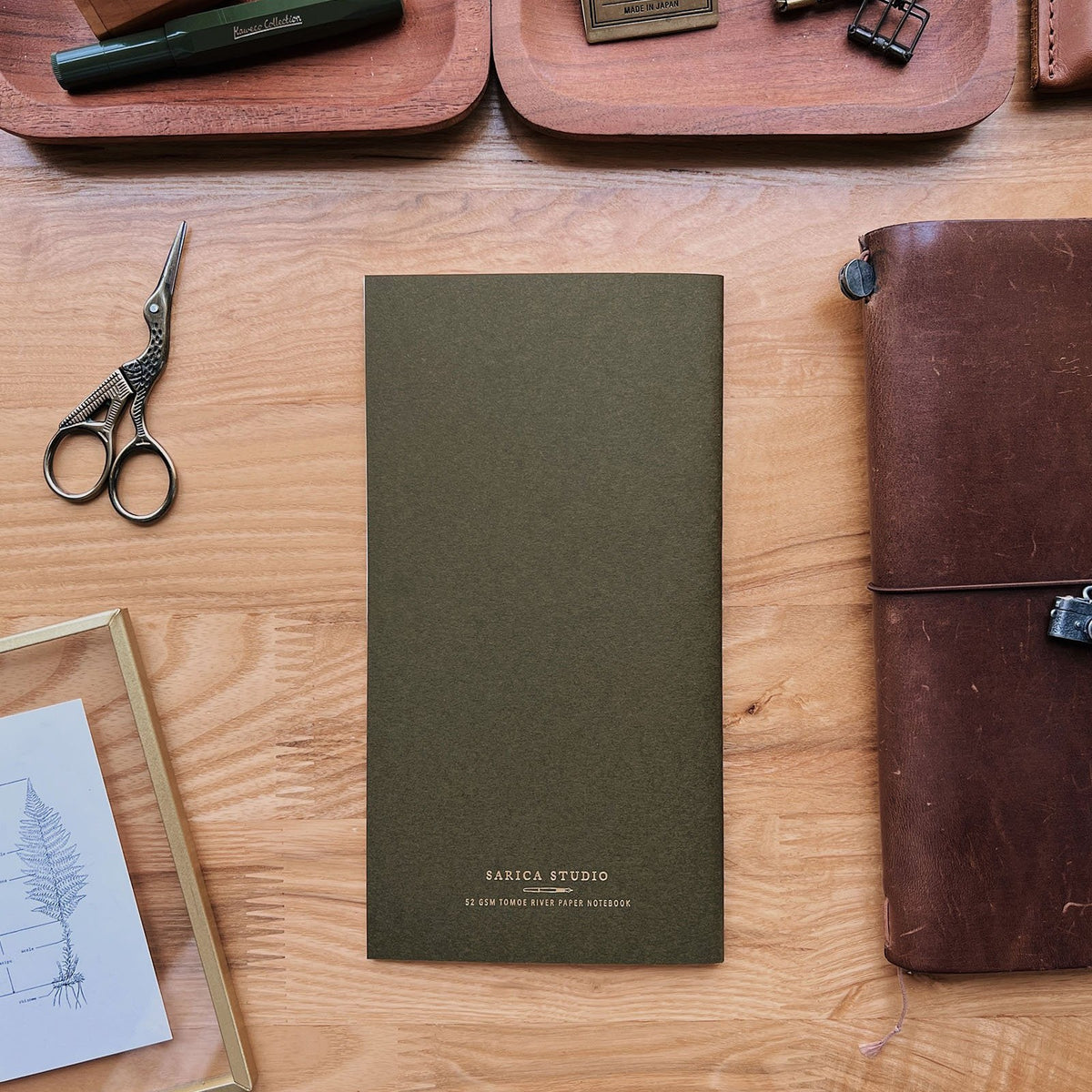 Sarica Studio Fern Notebook, standard TN size, back cover with the Sarica Studio logo