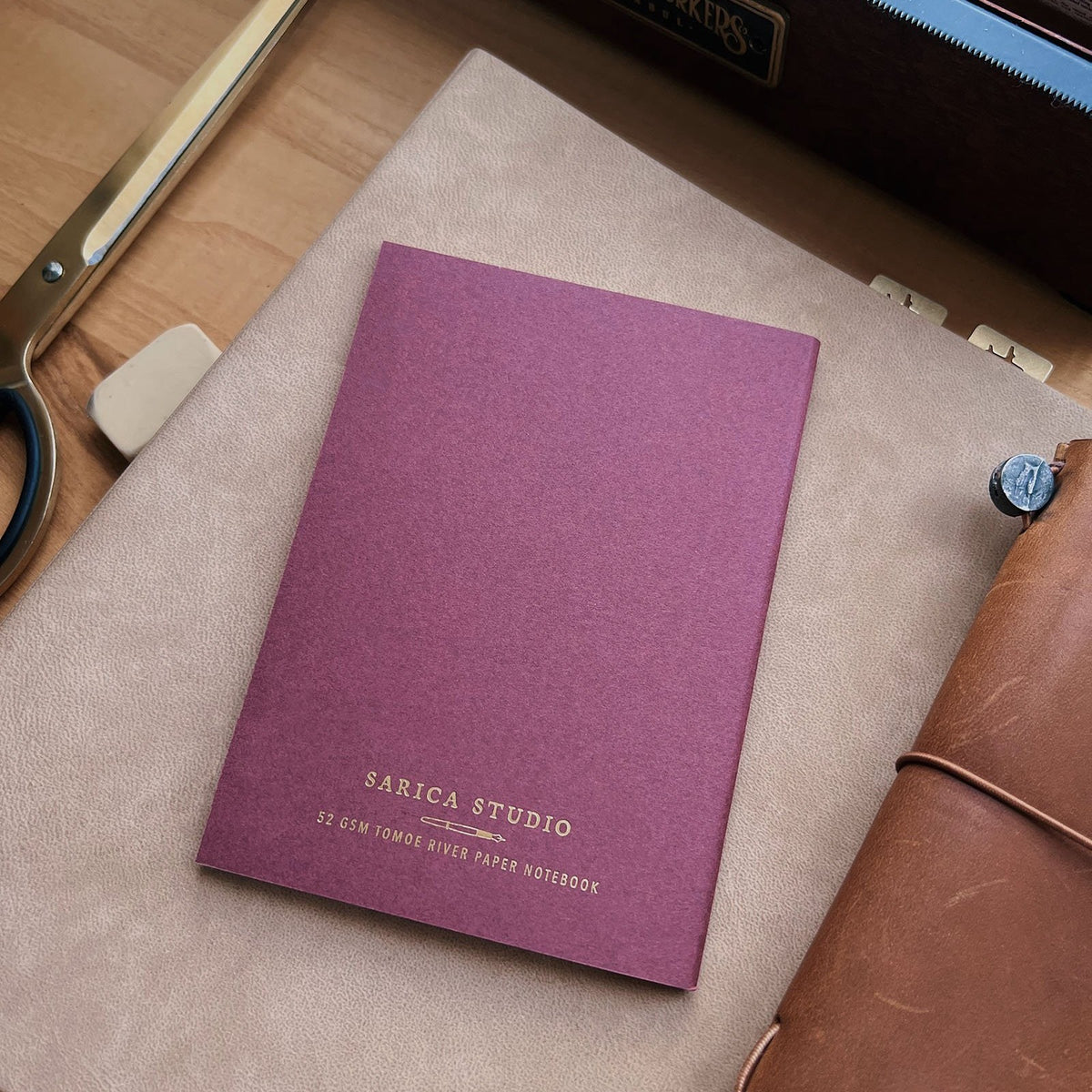 Sarica Studio Floral Notebook, passport TN size, back cover on a beige background
