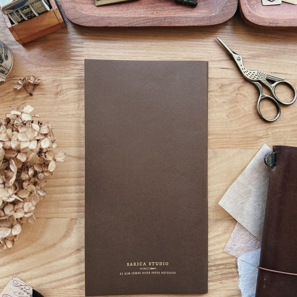 Sarica Studio Ginkgo Notebook, standard TN size, back cover with the Sarica Studio logo