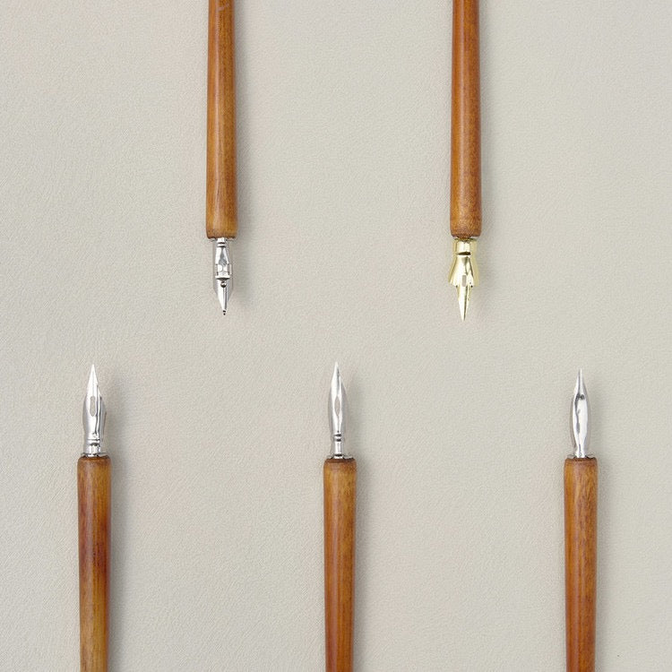 Wooden dip pens with nibs