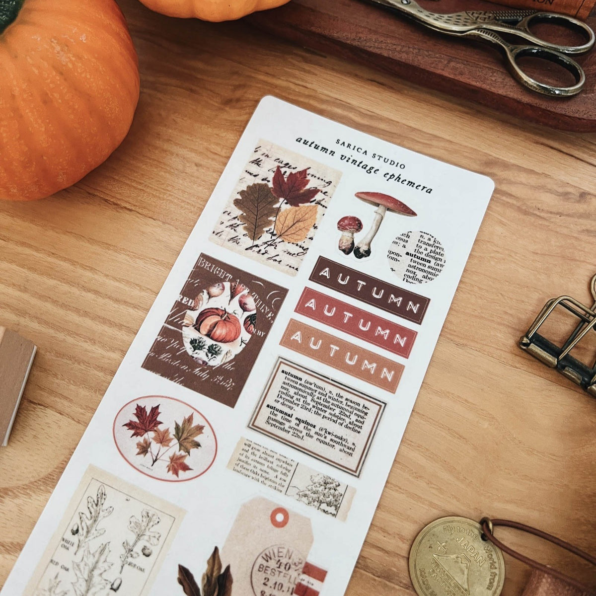 Sarica Studio Autumn Vintage Ephemera sticker sheet styled with fall journaling supplies