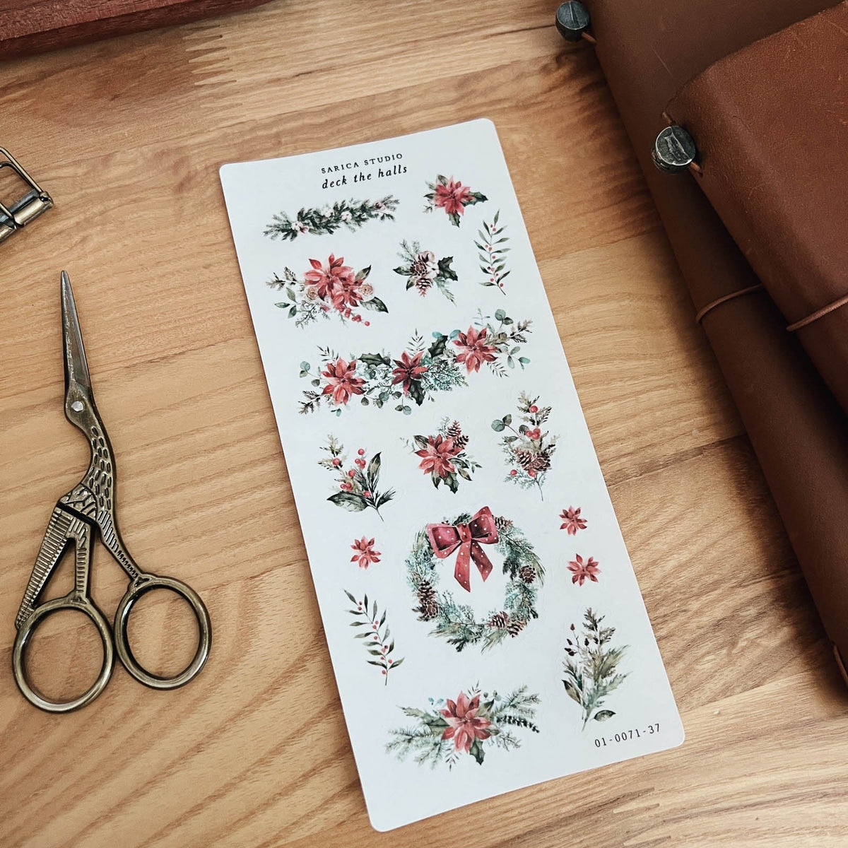 Sarica Studio Deck the Halls sticker sheet of red and green holiday greenery with scissors