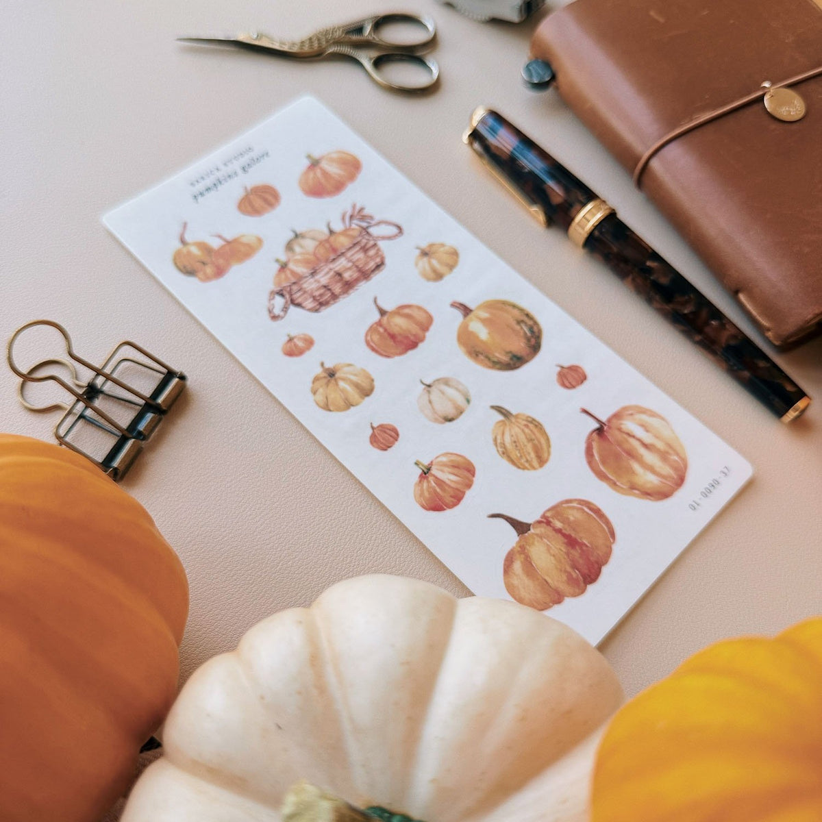 Sarica Studio Pumpkins Galore stickers, close-up of orange and white pumpkin stickers