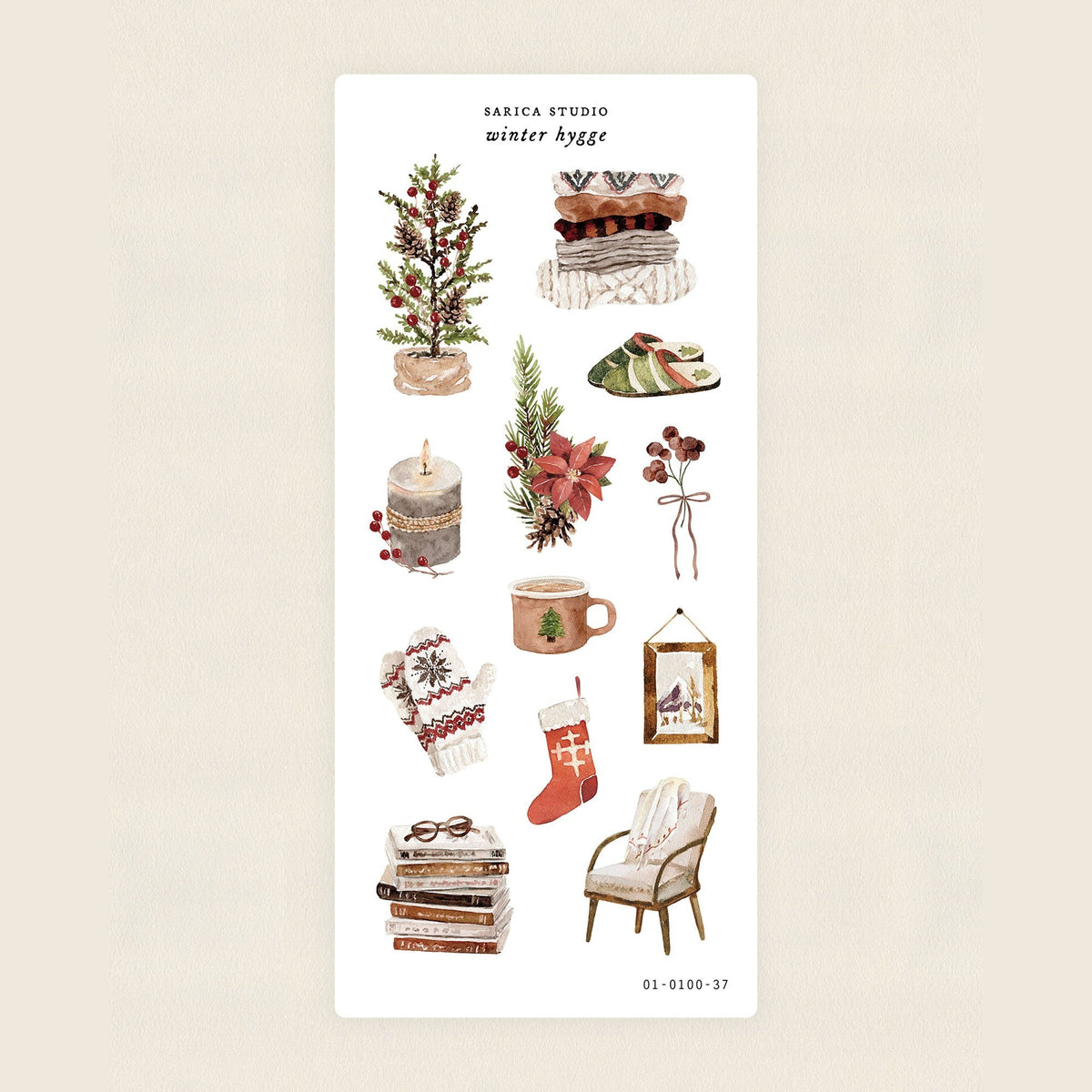 Sarica Studio Winter Hygge sticker sheet, clear matte stickers of a Christmas tree, books, candles and a knit stocking