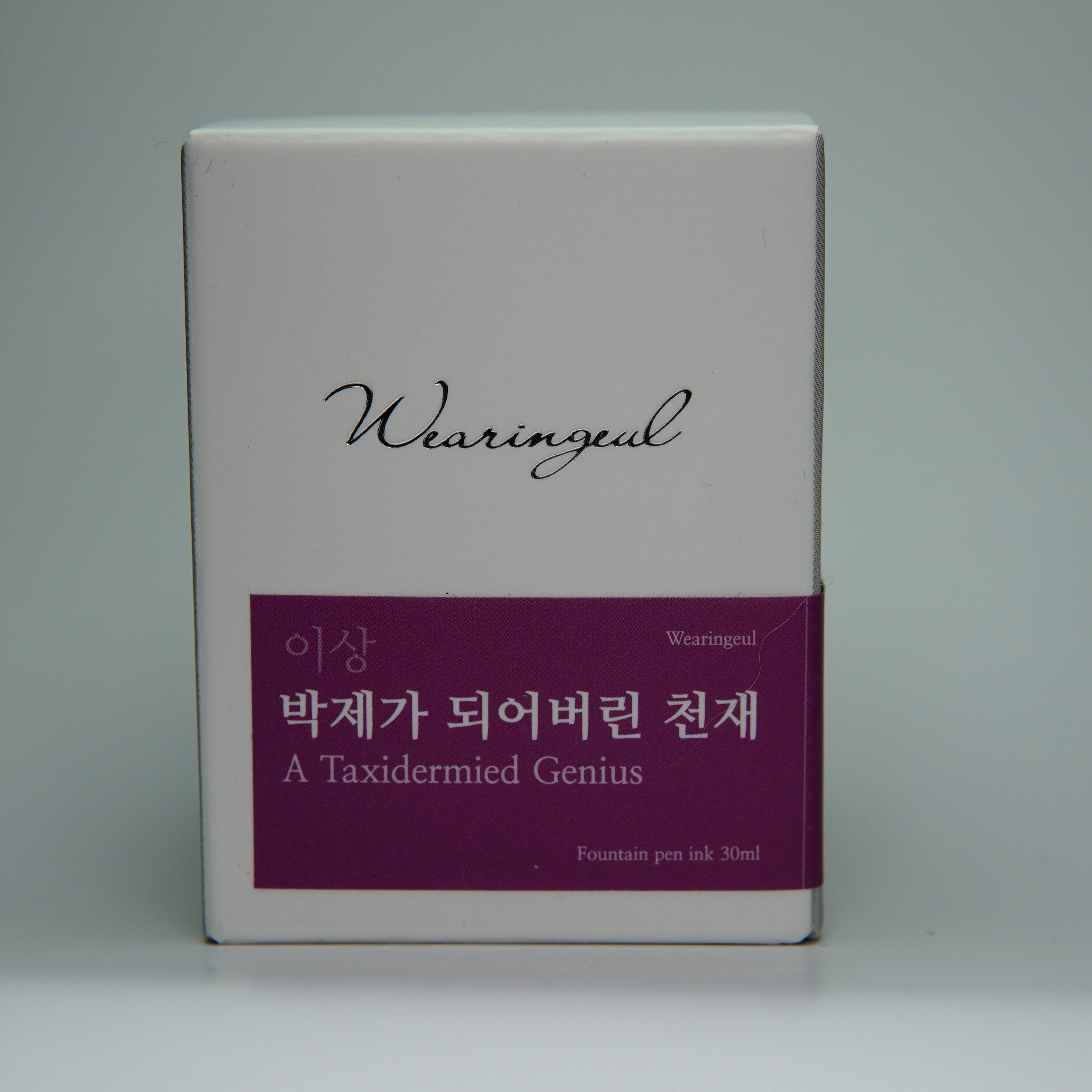 White box with red label