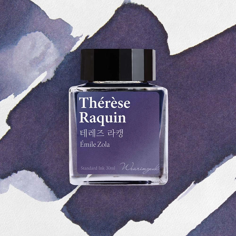 Wearingeul Thérèse Raquin fountain pen ink bottle with blue violet ink swatch background