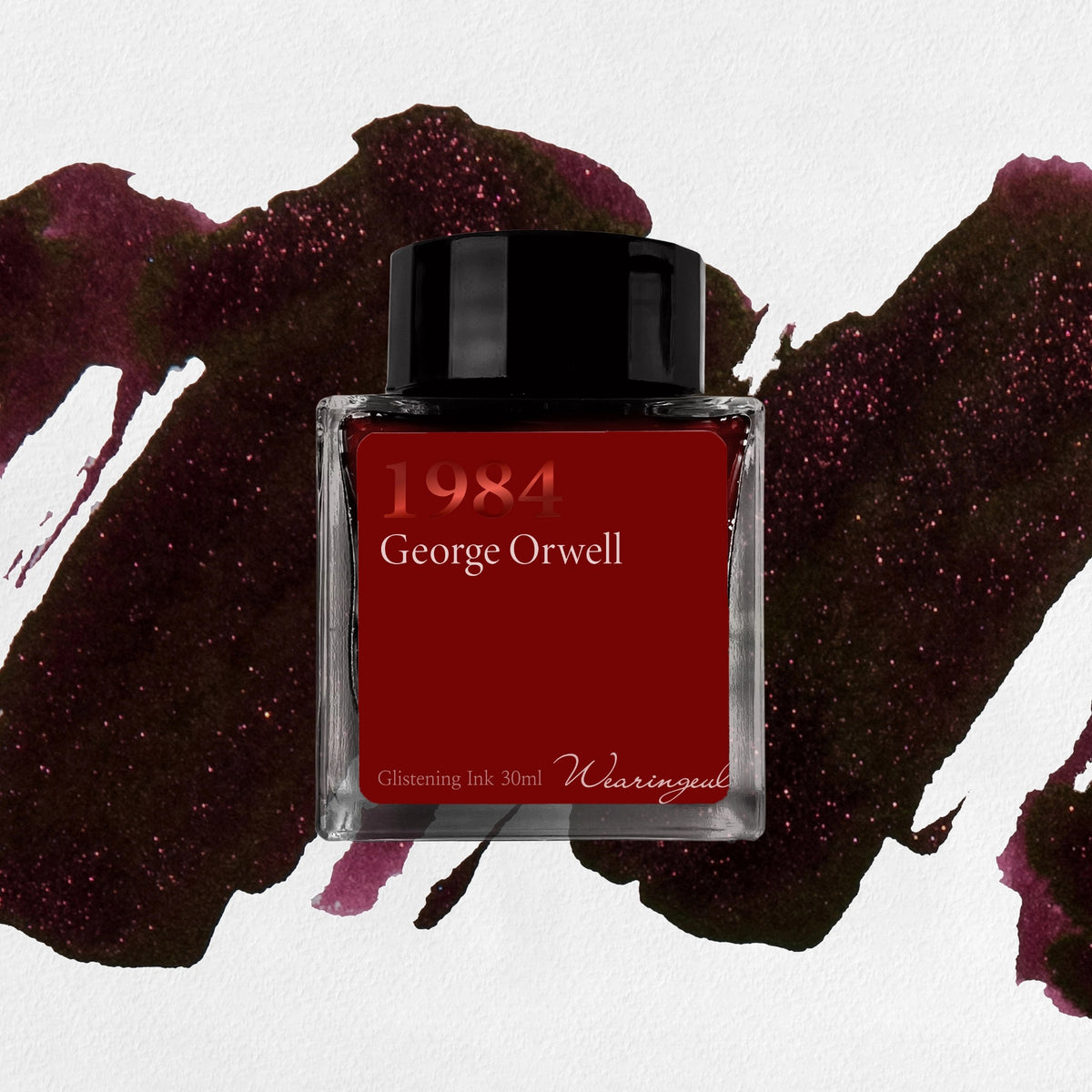 Wearingeul 1984 shimmer fountain pen ink, 30ml bottle, on a dark oxblood swatch with red shimmer