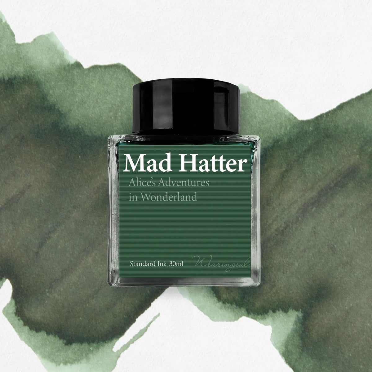 Wearingeul Mad Hatter fountain pen ink, 30ml bottle, on a gray green swatch