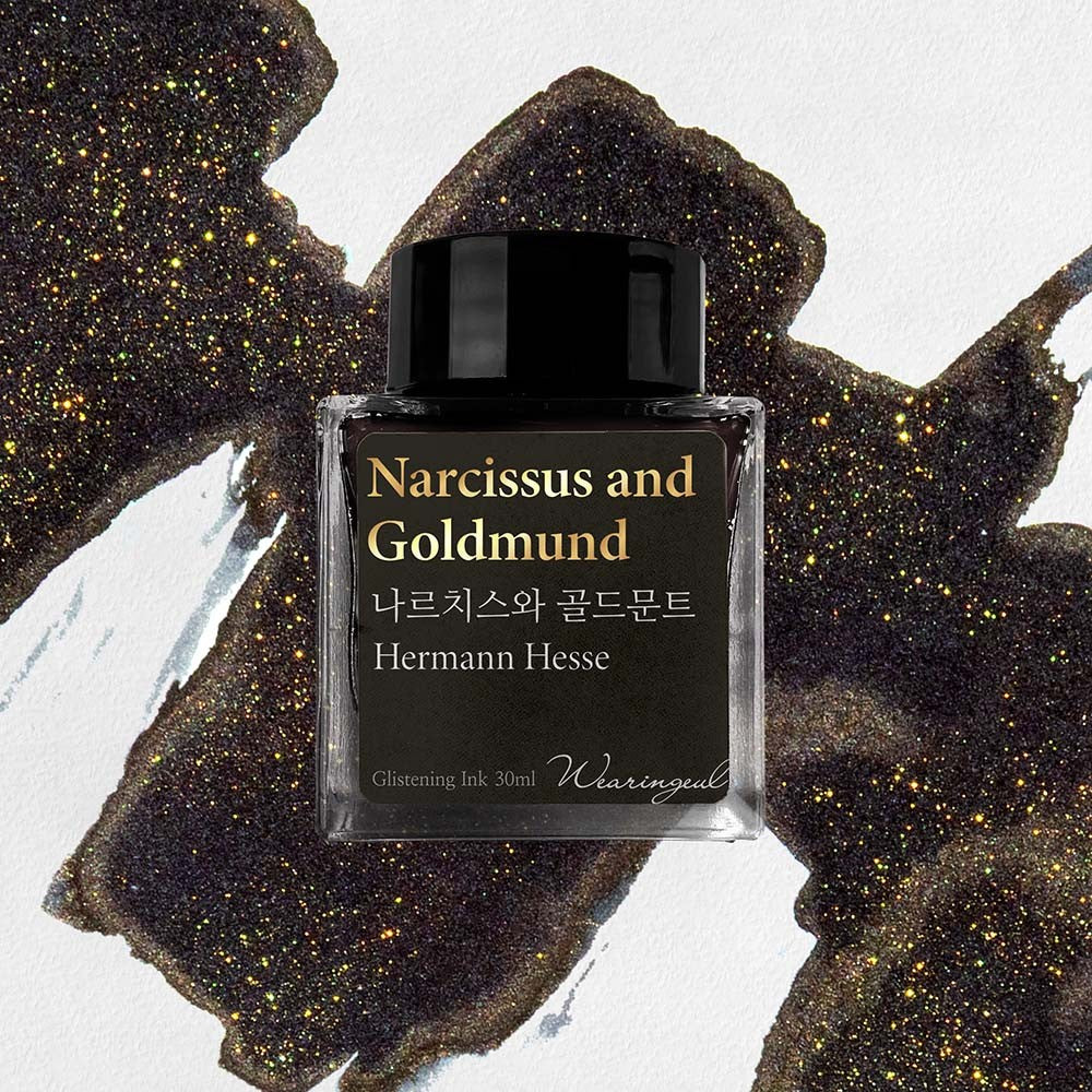 Wearingeul Narcissus and Goldmund shimmer fountain pen ink, 30ml bottle, on a dark swatch with gold shimmer
