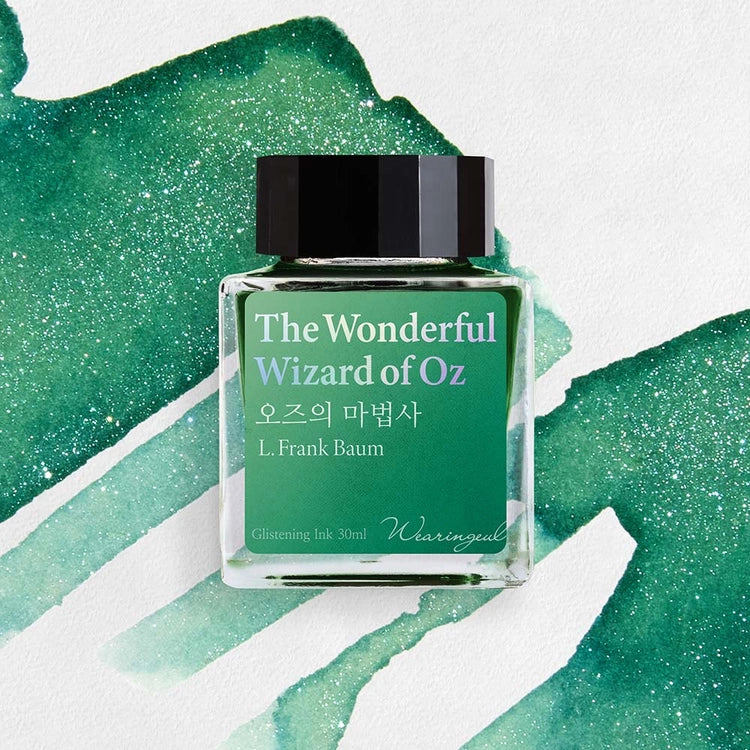 Wearingeul The Wonderful Wizard of Oz fountain pen ink bottle with emerald green ink swatch background