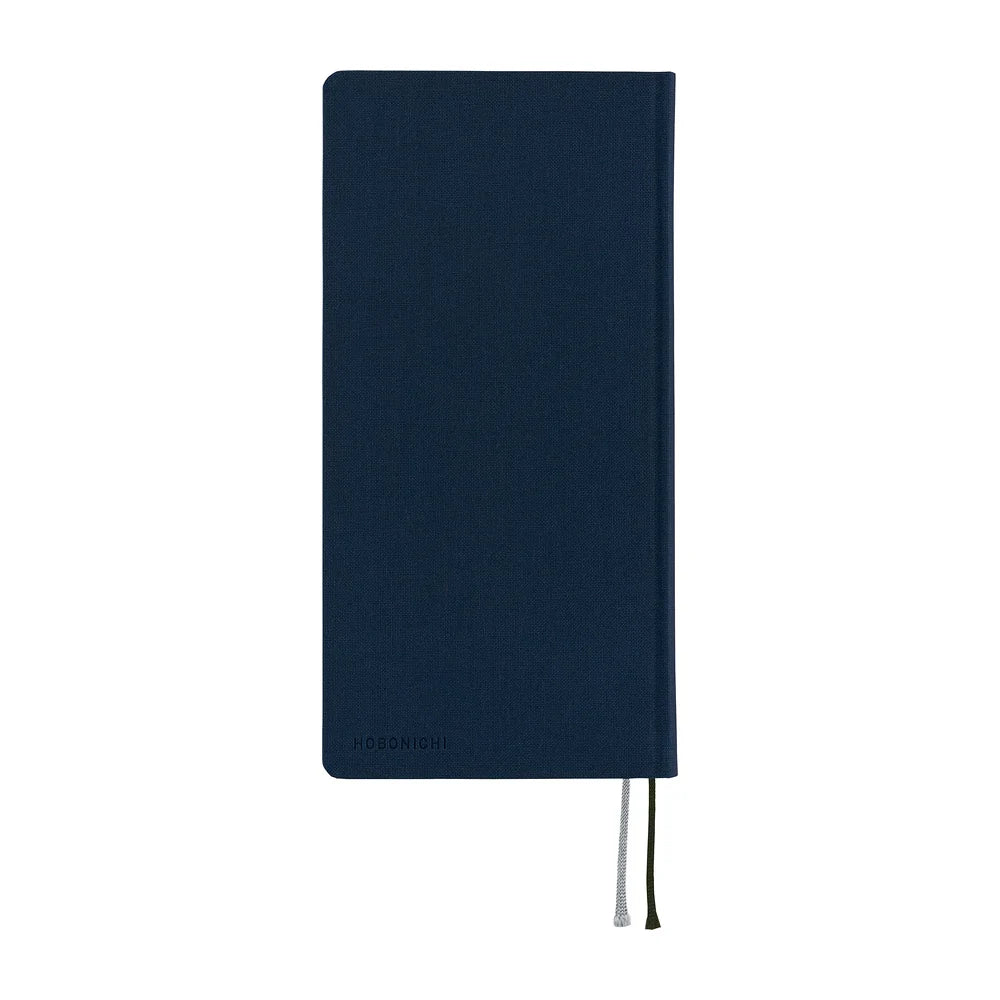 Hobonichi Techo 2027 Weeks planner, Colors Midnight Blue — back cover in deep navy cloth with HOBONICHI pressed into the fabric