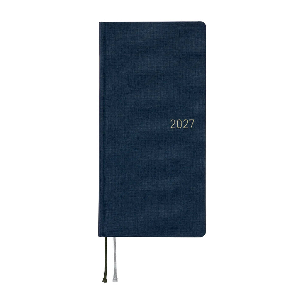 Hobonichi Techo 2027 Weeks planner, Colors Midnight Blue — solid deep navy front cover with the year foil-stamped in white gold and two ribbon markers