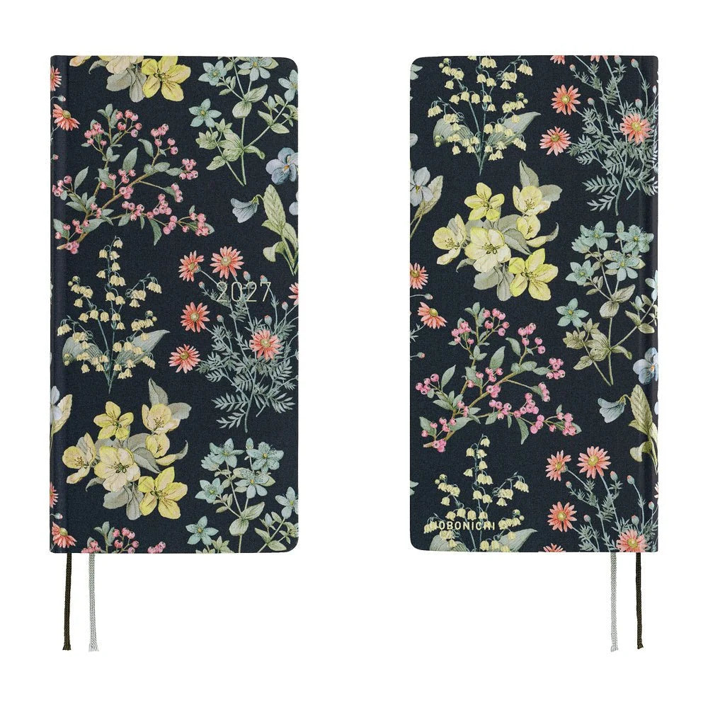 Hobonichi Techo 2027 Weeks planner, Liberty Fabrics Floral Remedy — front and back covers side by side, navy blue with pale pink, yellow and sage botanicals