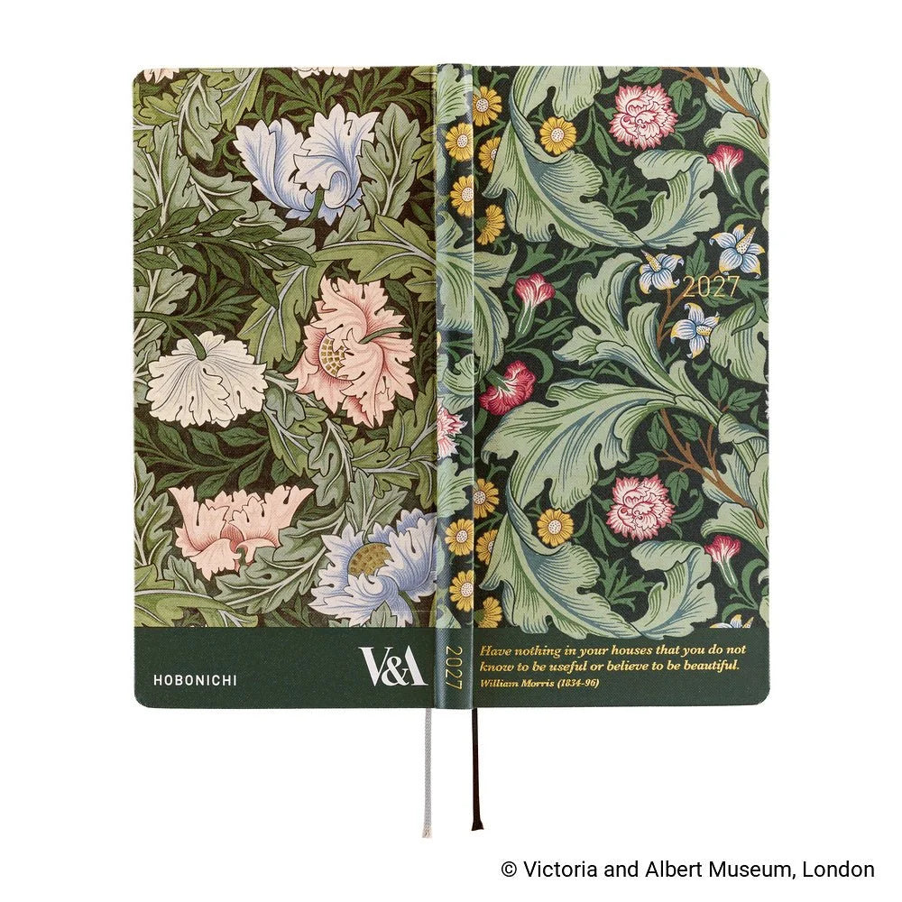 Hobonichi Techo 2027 Weeks planner, V&A Series Leicester — laid flat showing the green wallpaper pattern across front, spine and back with the gold foil William Morris quote