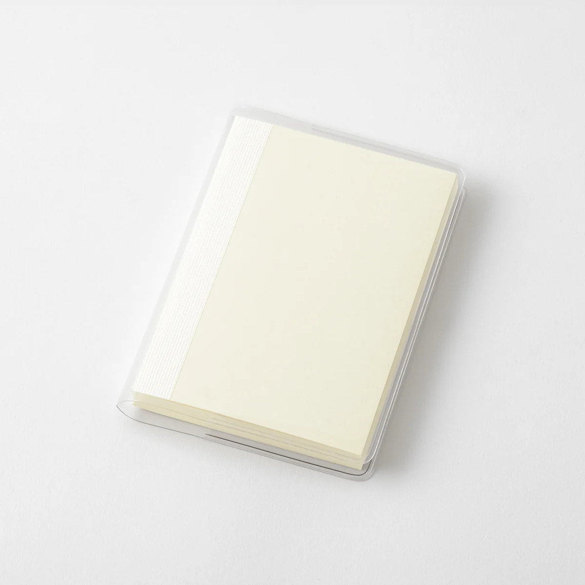 MD Notebook Cover A7 fitted over a cream MD Notebook, angled view