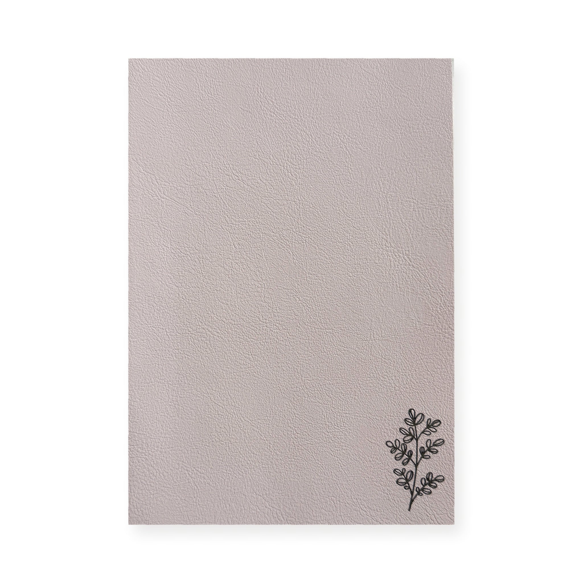 Planner Monkey Co Freely Noted A5 notebook in blush pink, front cover shown flat on white with a botanical sprig printed in the lower corner